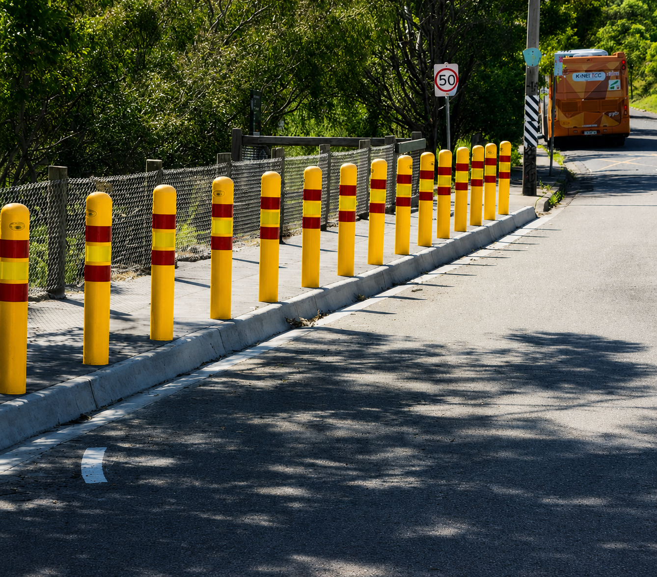 Safety bollards providing separation between vehicles and protected areas